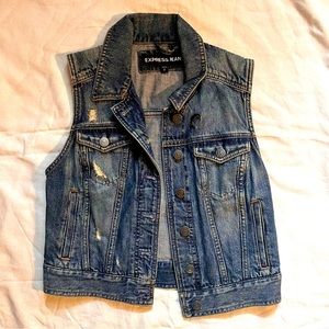Denim vest with Medusa back patch, size small.